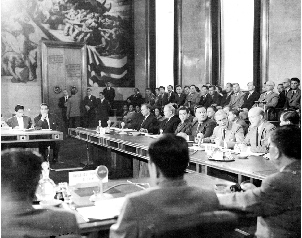 Geneva Conference, 21 July 1954. Last plenary session on Indochina in the Palais des Nations. Second left Vyacheslav Molotov, two unidentified Soviets, Anthony Eden, Sir Harold Caccie, and W.D. Allen. In the foreground, the North Vietnamese delegation