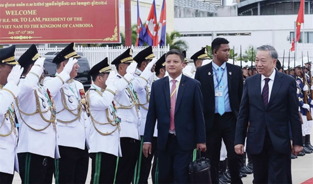 President To Lam (right) concluded his successful state visit to Cambodia on July 13. He was given a warm send-off by several senior ministers and government officials. VNS